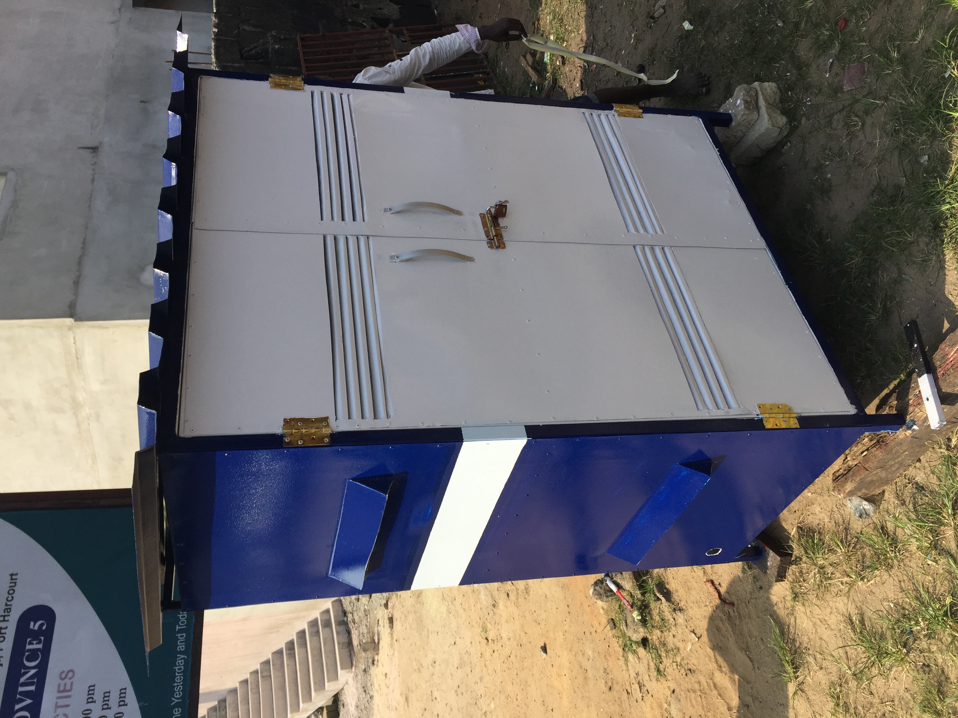 completely-white-and-blue-painted-inverter-storage-units-showing-front-and-right-side